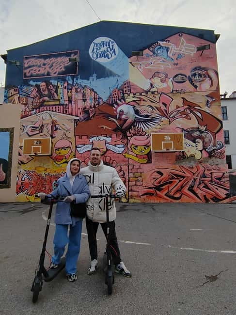 Street Art E Scooter tour - Riding through three urban neighborhoods