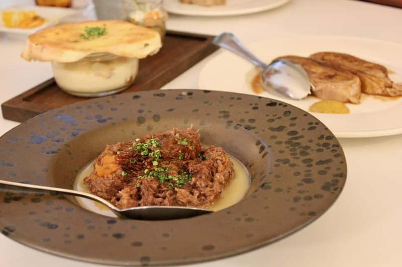 Taste Belgrade Tour - Serbian Gourmet Adventure - Bakery Tasting with Cheese, Cured Meat, Honey, and Rakija